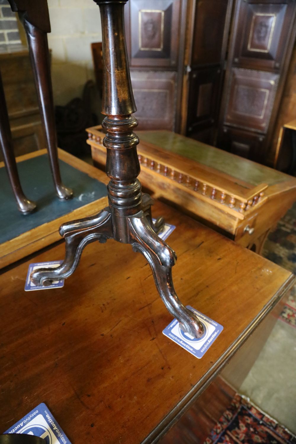 A Victorian octagonal rosewood tripod table, width 45cm, depth 74cm together with one other rectangular tripod table